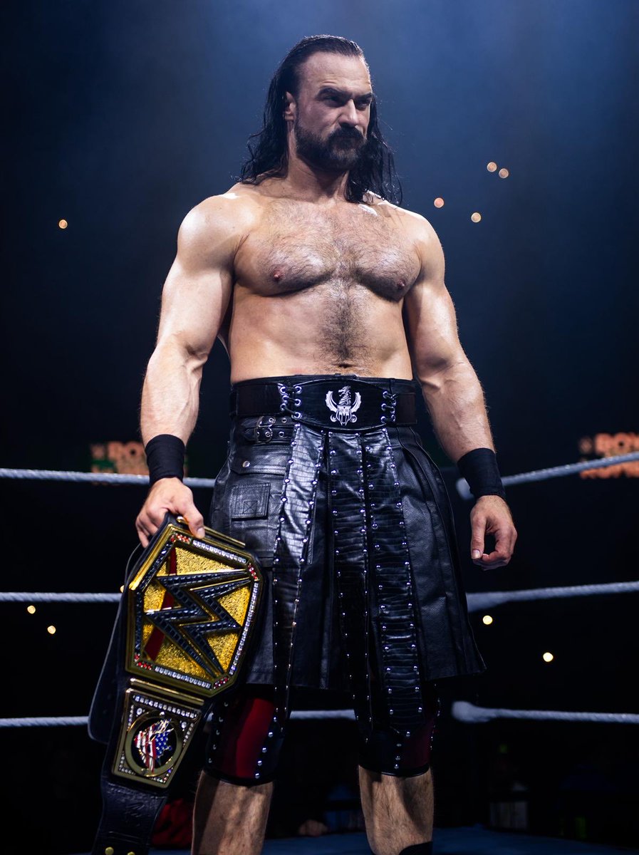 DMcIntyreWWE's tweet image. No t-shirt needed. This is what a real Champion looks like.