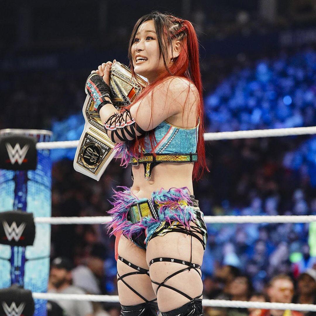 Fightful's tweet image. Iyo Sky and Drew McIntyre are the first two wrestlers to win the current designs of the WWE Championship and World Championship.