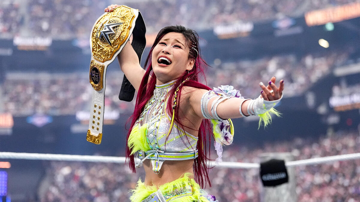 Fightful's tweet image. Iyo Sky and Drew McIntyre are the first two wrestlers to win the current designs of the WWE Championship and World Championship.