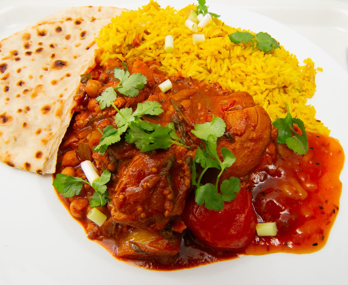 Getting my evening meal ready ahead of tonight's Night Manager. Home-made Chicken Curry with home-made Pilau Rice, served with Geeta's Mango Chutney and a couple of Flatbreads, and sprinkled with fresh Coriander and fresh Spring Onions.