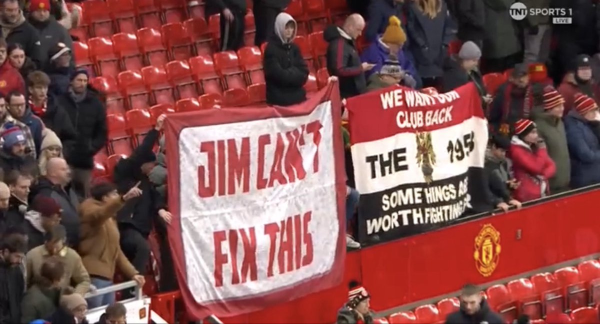 A ‘Jim can’t fix this’ sign at Old Trafford.