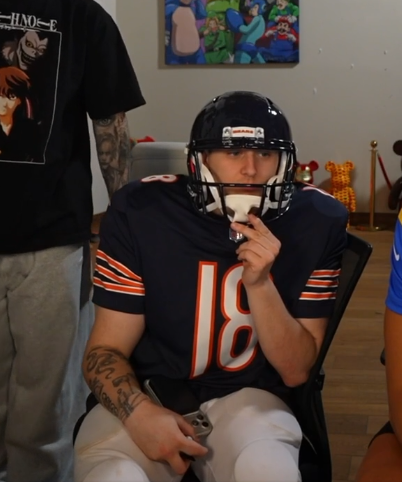 he looks like he gets shoved into lockers