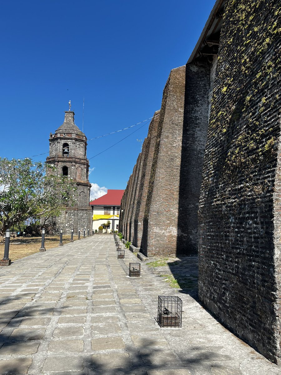 TeN's tweet image. Centuries stand still here where the belfry of one of the four magnificent Baroque Churches of the Philippines, Sta. Maria Church, is still watching over llocos Sur just like it did in 1810.  massive brick walls, earthquake-proof buttresses. it needs protective plastering though.…
