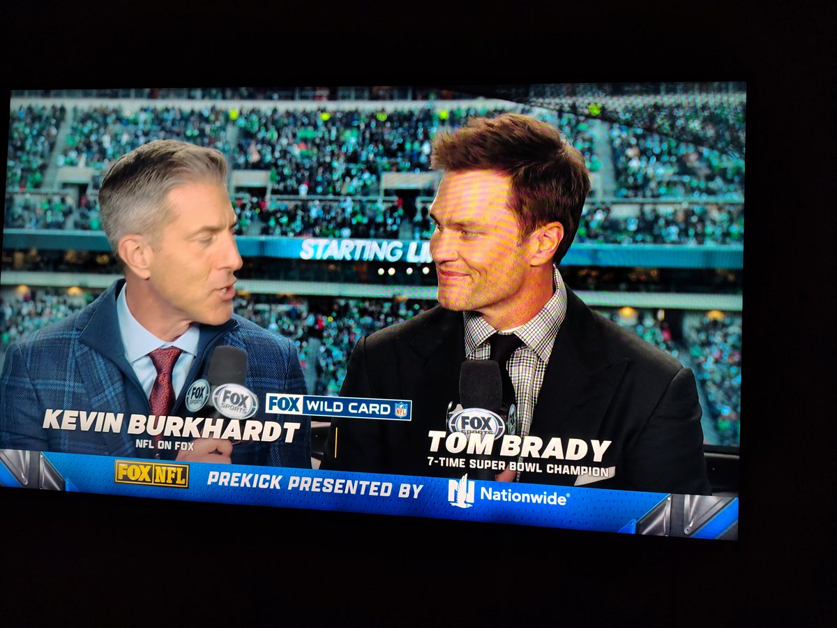 funniest running thing in sports broadcasting is "Tom Brady, 7-Time Super Bowl Champion," and Kevin Burkhardt, some guy who works here