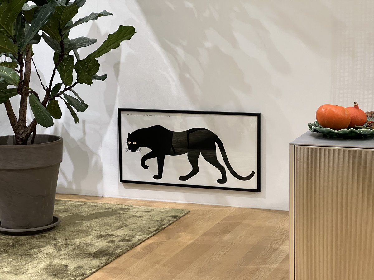 very moved by this cat print hung so low to the ground so as to look like it’s stalking