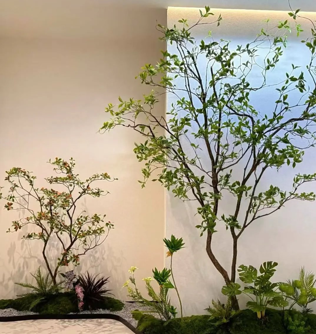 🌿✨ Bringing Nature Indoors.✨🌳 This breathtaking indoor garden creates a serene escape right at home. With every lush leaf and clever corner, it reminds us to pause and connect with the beauty of nature. 🌱💚