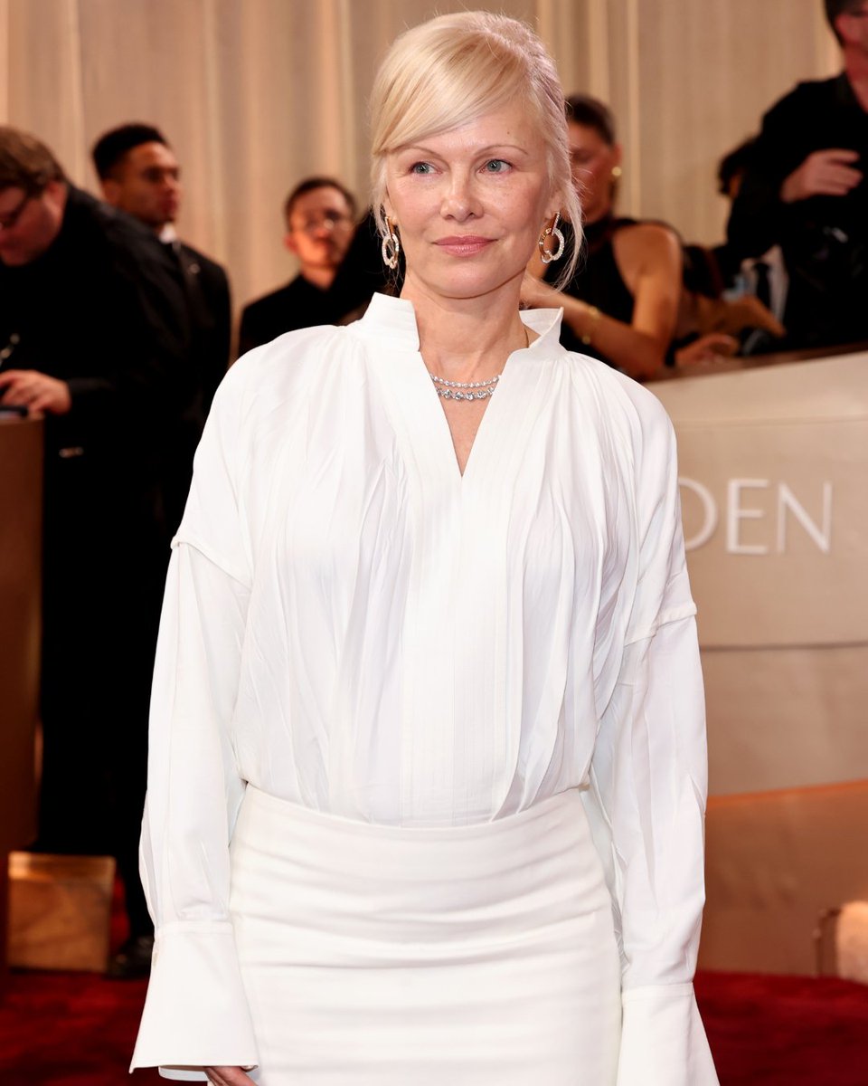 PageSix's tweet image. Pamela Anderson proves she is, was, and always will be that girl on the 2026 Golden Globes red carpet. 🤍 📸: Getty