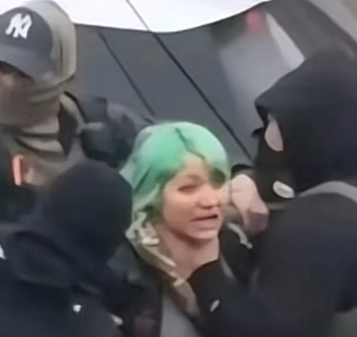 MAGACult2's tweet image. This also happened in Minnesota today. Here are three out of the four ice agents it apparently required to detain one Minneapolis woman (1 off photo).

Notice one of them strangling her. This is not going to stop. This will only escalate. We have been warning you for a decade.