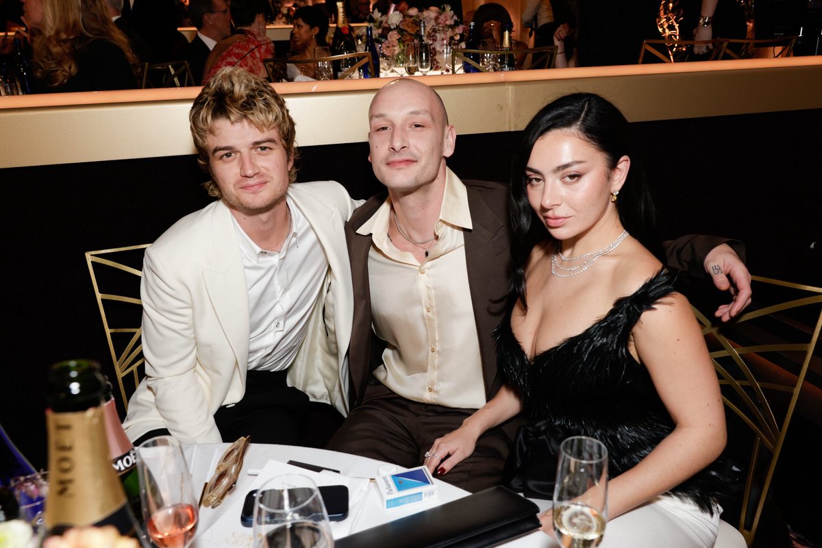 A new photo of Joe Keery with Charli XCX and George Daniel at the #GoldenGlobes