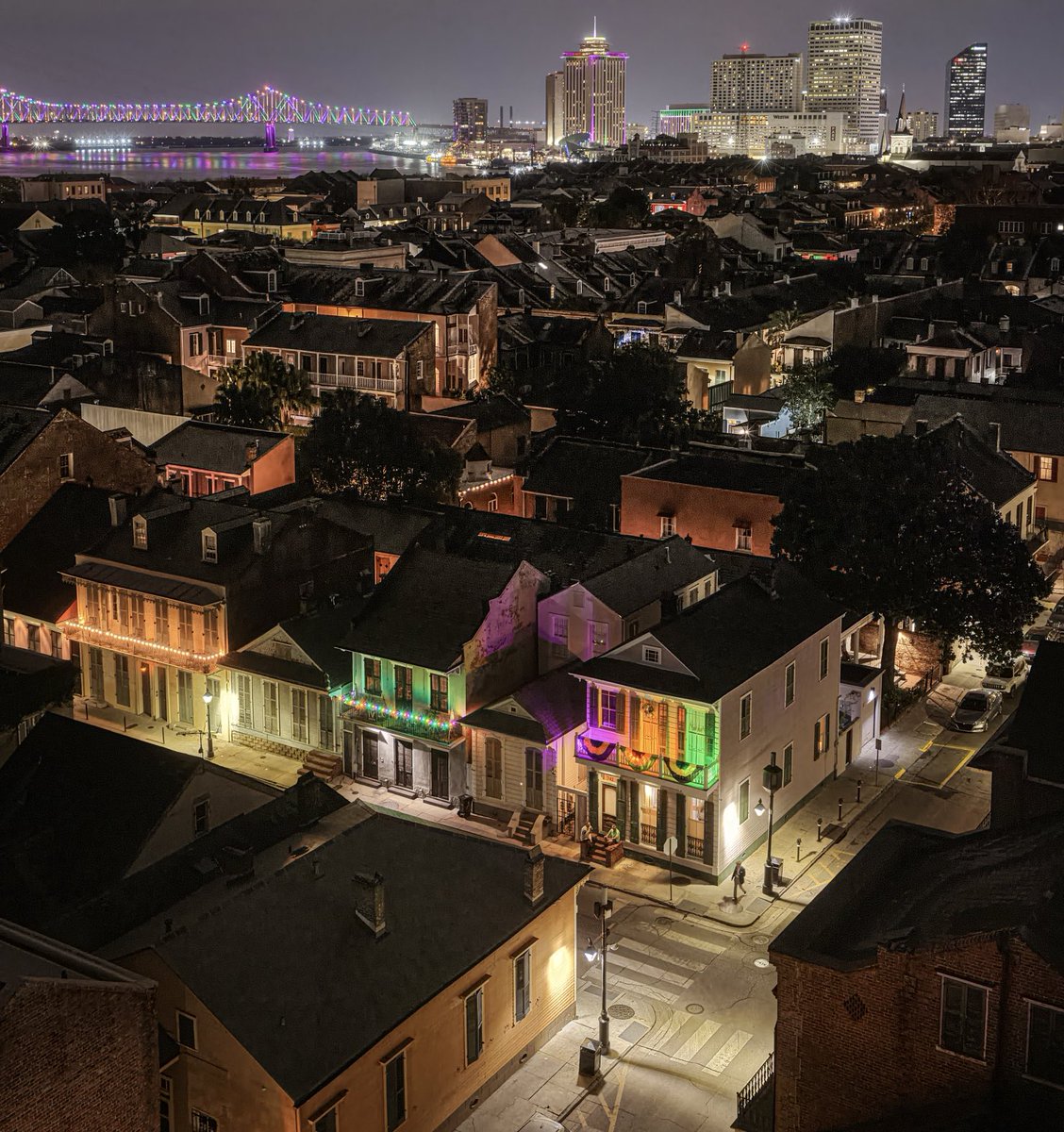 marcorasi1960's tweet photo. Mardi Gras colors from the bridge to the foreground (Barracks at Bourbon), New Orleans https://t.co/ga8jUtaJlC