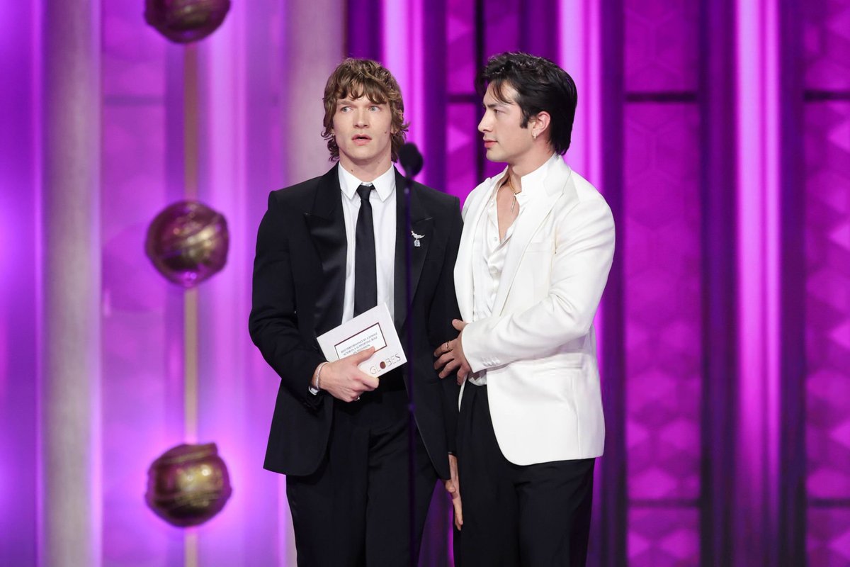 connorstupdates's tweet photo. VANITY FAIR:  Connor Storrie and Hudson Williams Put Their Backs Into It at the Golden Globes 2026

"It doesn’t matter that they weren’t eligible for awards. The Heated Rivalry stars were the big winners of the night anyway.
Williams and Storrie got prime seating placement at the Globes, sitting at a table with Paul Mescal, Charli xcx, Keegan-Michael Key, and Justin Hartley—and right next to the table where Leonardo DiCaprio was seated. They did red carpet interviews: Storrie wearing a black Saint Laurent suit with a thin black tie, draped in Tiffany and Co. jewelry, and Williams in a black and white Armani tuxedo — cummerbund included — Louboutin shoes, and Bulgari jewelry. [...] The two even got to enjoy that very specific awards show rite of passage: a joke written into the host’s banter."

🔗 Read the full article here: https://t.co/cX1Vievkwr