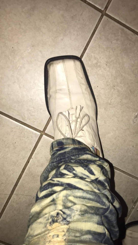 WittyLevi's tweet image. Trying on her husband’s shoes…