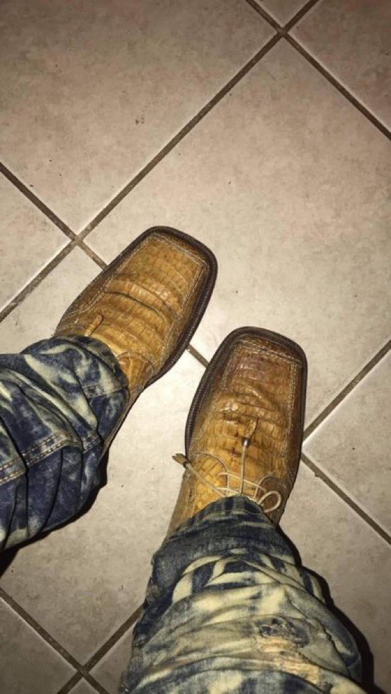 WittyLevi's tweet image. Trying on her husband’s shoes…