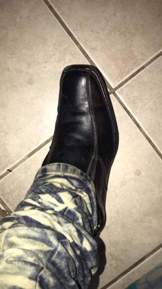 WittyLevi's tweet image. Trying on her husband’s shoes…