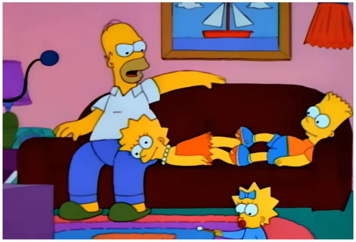 This shot here perfectly sums up "dad life" to me. 

Youngest keeping herself occupied with her toys, older siblings not doing anything overly wrong, but clearly being enough of a nuisance for Dad to not hear the footy on TV. Regardless, there's nowhere else he'd rather be.

The