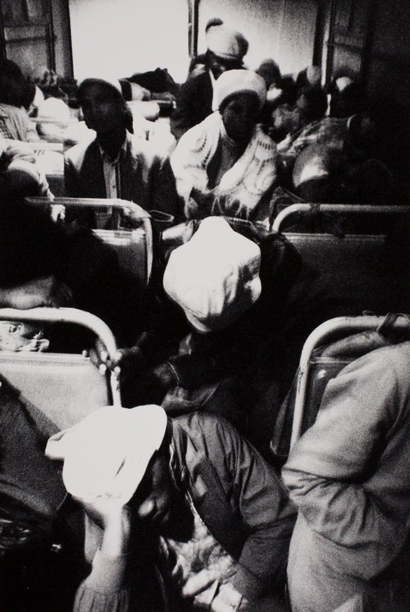 HistorySAZAR's tweet image. 3:30 a.m. Going to work, c 1983. Image Source: “The Transported of KwaNdebele” by David Goldblatt