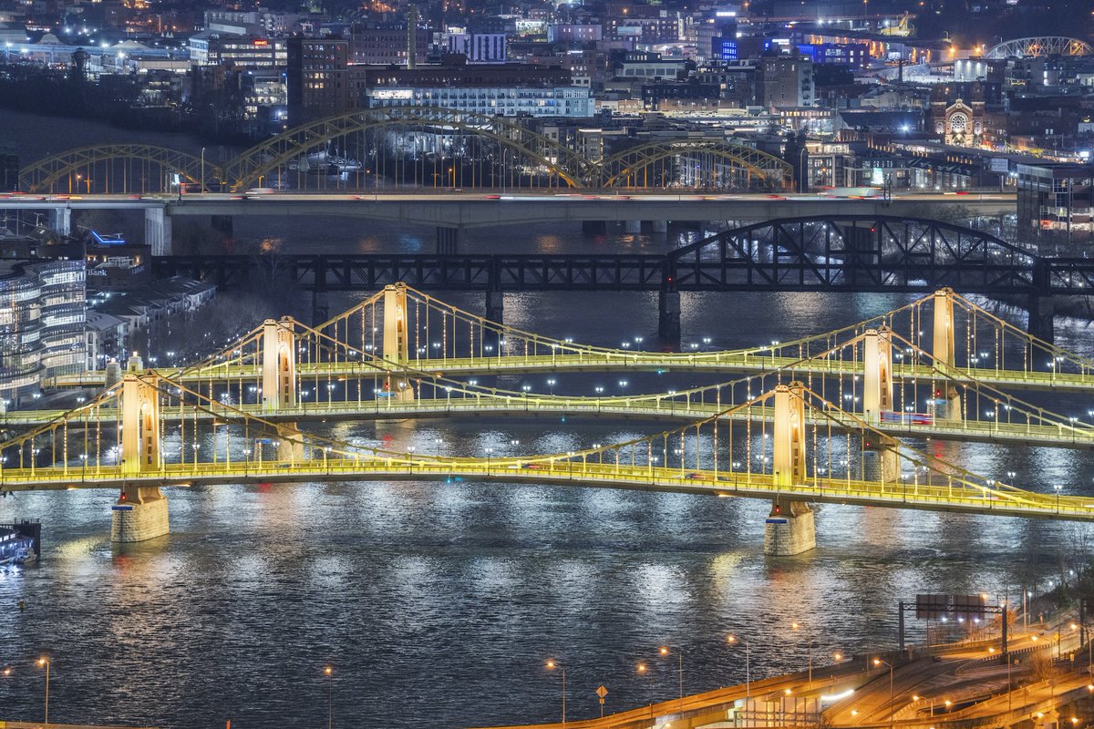 DaveDiCello's tweet image. This morning most of #Pittsburgh was lit up black and gold in preparation for the #Steelers playoff game tonight, and Sister Bridges even had this black and gold sparkle on the supports. Always amazing to see the city lit up like this.

#HereWeGo
