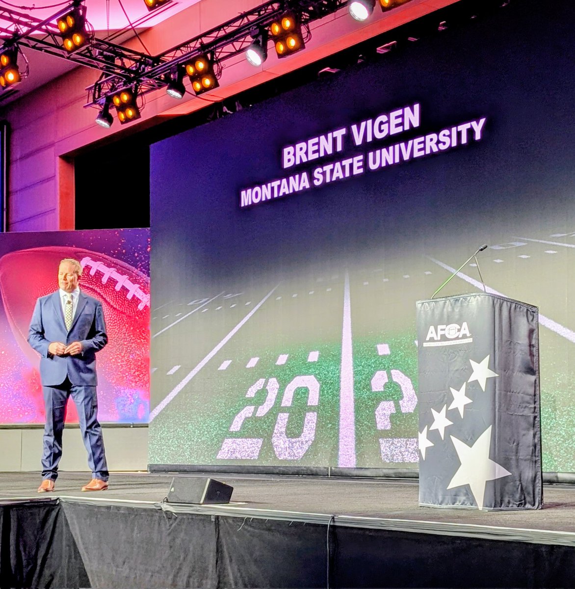 WeAreAFCA's tweet photo. Coach Vigen is on stage now!

📍Crown Ballroom https://t.co/qM3prDdEYJ