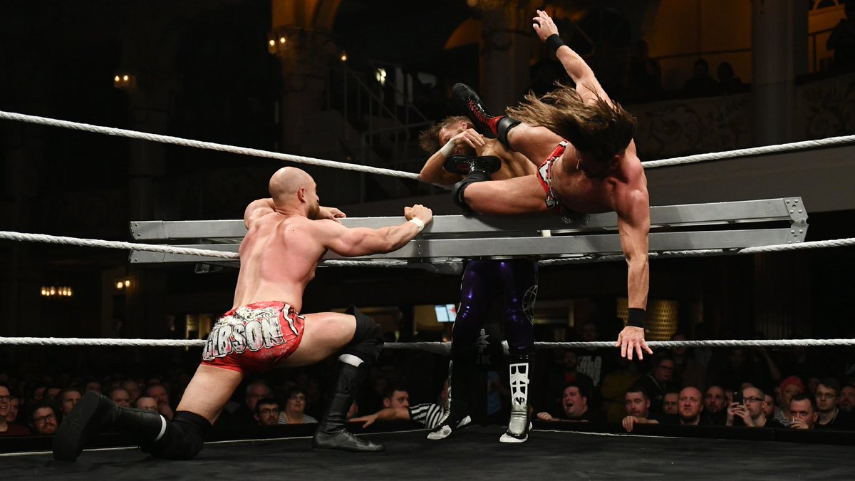 NXTUK_Legacy's tweet image. Jan. 12, 2020:

At Empress Ballroom, @m_coffey90 &amp;amp; @WolfgangYoung defeated @wwe_kaiser &amp;amp; @VinciWWE, GYV (#JamesDrake &amp;amp; @ZackGibsonGYV), and @Flash_Morgan &amp;amp; @MandrewsJunior in a Ladder Match to retain #NXTUK Tag Team Titles in the co-main event of Takeover: Blackpool II. 

📸 WWE