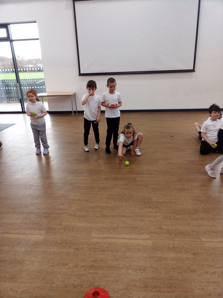 GCPYEAR2's tweet photo. In PE we have been practising rolling and sliding objects to get close to a target @PrimaryGreat #gcppe https://t.co/A8a3sJOL6f