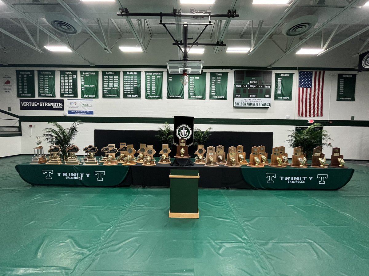 trinitysports's tweet photo. An incredible morning in Steinhauser Gym. Trophies on the floor. Brotherhood in the room.

Celebrating academic excellence, 2025 state championships, and the Trinity tradition—past and present—at today’s Sports &amp; Activities Assembly.

Trinity Forever.  ☘️🎓🏆 https://t.co/QZmoQTxhJy