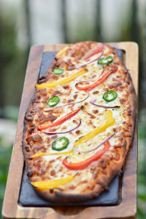 Table55Miami's tweet image. Flatbread so good you’ll forget it’s technically “just bread.” Grab yours at Table 55 at the @HiltonMiamiDadeland. 😋