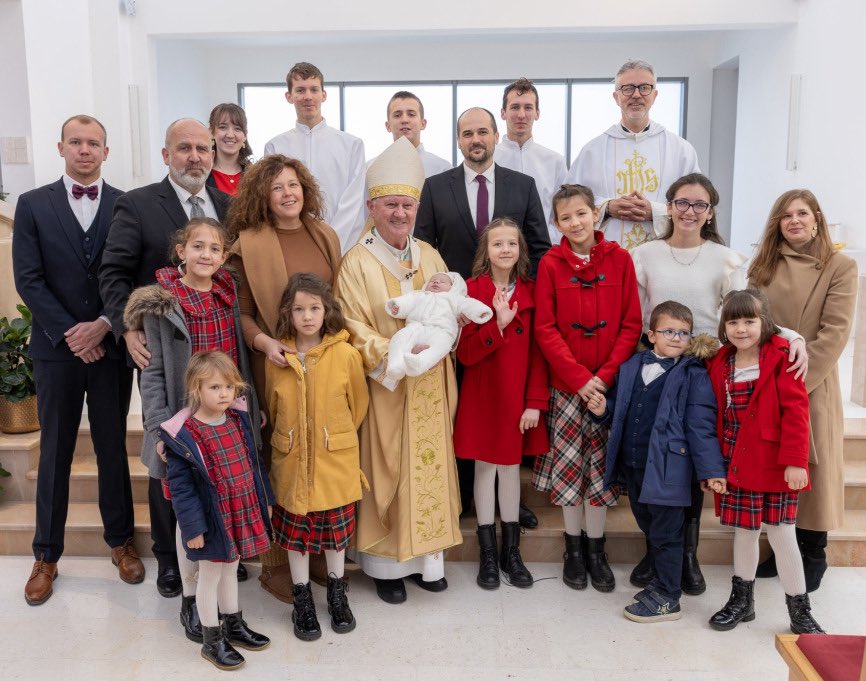 A Catholic family in Croatia celebrated the baptism of their 15th child. The Mass was celebrated by Archbishop Zdenko Križić of Split.

Image: Bitno net