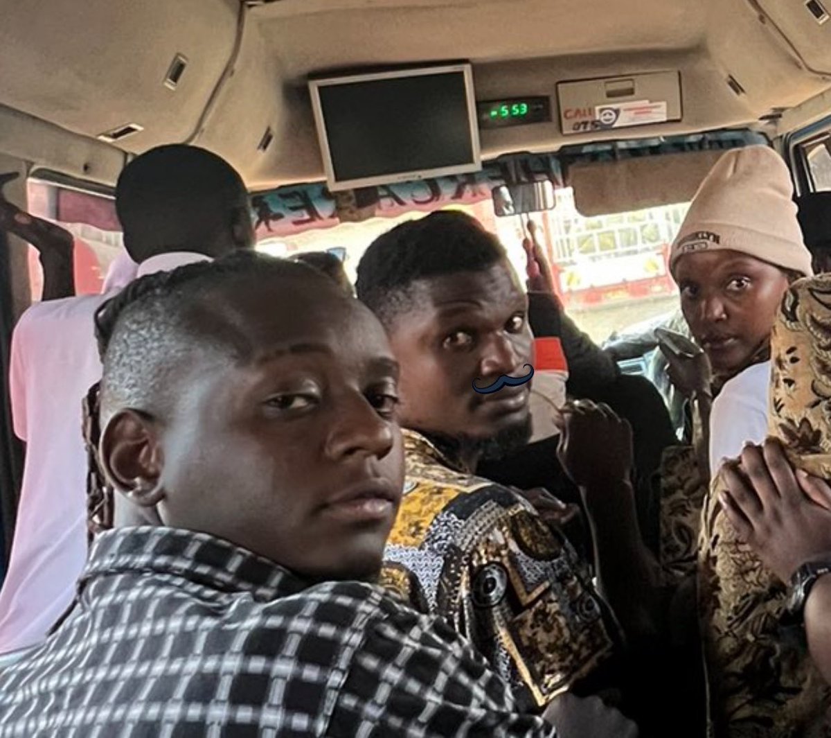 Woman at the back; “Mzeii yaleta emirembe, twebaka wadde tuli bavvu”