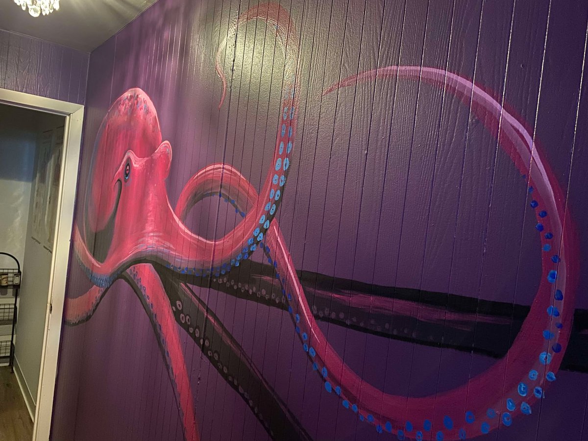 Geo Alderson just painted this incredible octopus mural in our hallway 🐙💜 Huge thanks, Geo! Check out her work: linktr.ee/geoalderson

She’s back tomorrow painting our front window - stop in later this week to see it all!