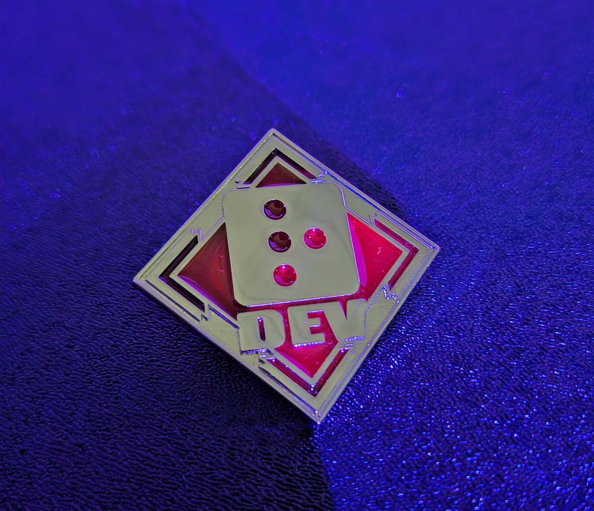 マーケティングの方から開発者ピンバッジをいただきました！ALGSでEA