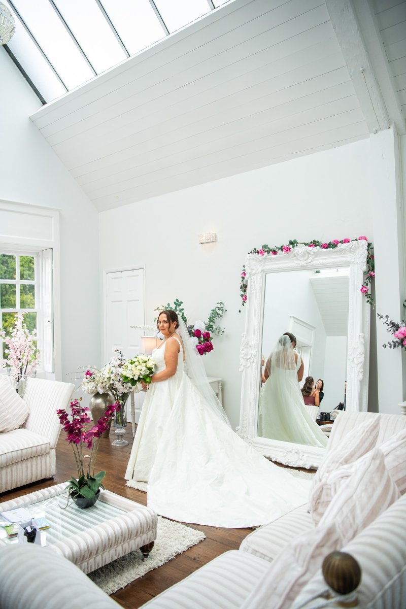 A quiet moment before forever 🤍✨Kathleen, radiant in the bridal suite. 
📸 Swains Studio 
 #HuttonHall #HuttonHallWedding #weddingvenueessex #bridalsuite #weddingvenuehunting #wedddingdress #weddingday #BrentwoodEssex