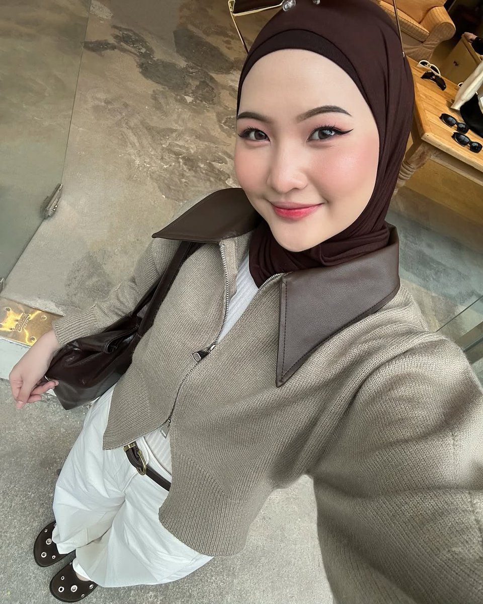 btflfairy's tweet image. earth tone outfit with hijab
— a thread
