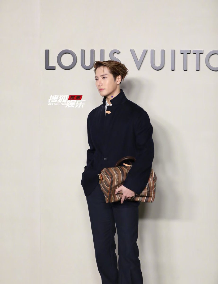 Jackson Wang of GOT7 steals the spotlight at the opening of the Louis Vuitton Maison in Beijing, China.