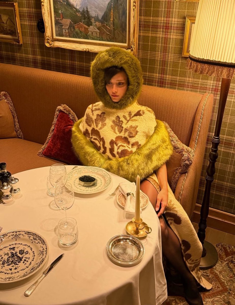 livia wearing a custom lovro lukic ensemble made of vintage rugs 🏔️