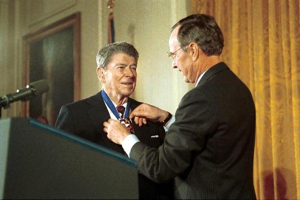 RonaldReagan's tweet image. On this day in 1993, President George H. W. Bush (@BushFdn) awarded Ronald Reagan the Presidential Medal of Freedom, the nation’s highest civilian honor. In his remarks, President Bush said: "Some men reflect their times. Ronald Reagan changed his times."