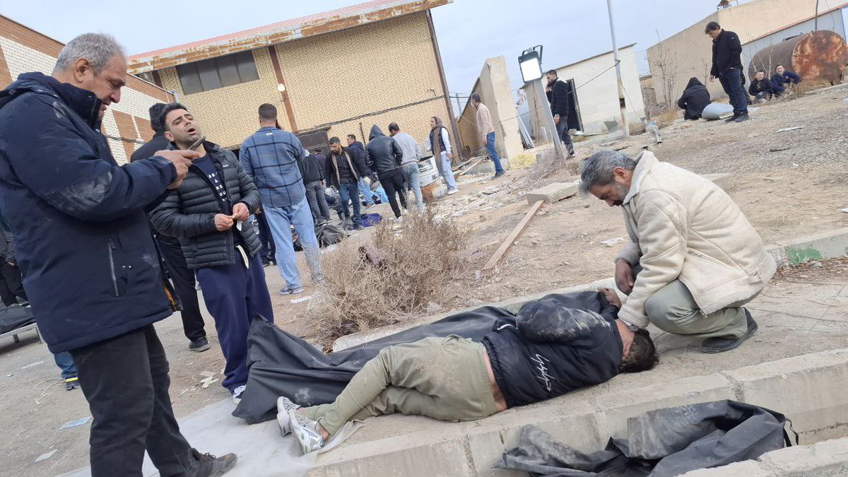 citizendossier's tweet image. I’m posting here for more visibility on behalf of these people. Videos emerging of Iranians congregating at morgues in search of their loved ones. A partial video clip I located and which is originally about 14 minutes long showing bodies after bodies.