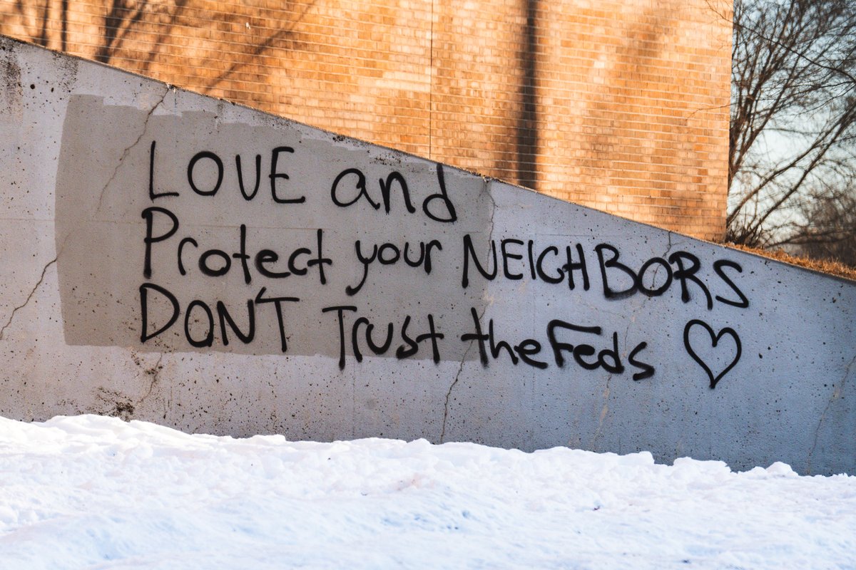 "Love and Protect your Neighbors Don't Trust the Feds" seen on a Minneapolis middle school.

South Minneapolis, January 2026