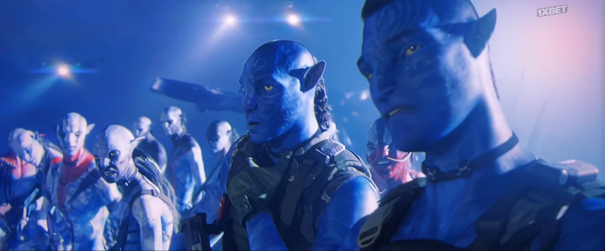 Quaritch mogging the camera like an onlyfans model while Lyle is smoking 40 cigarettes in his mind