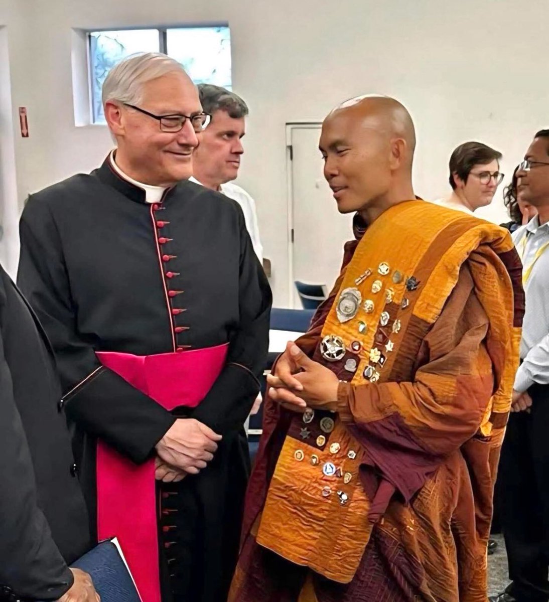 A monk.
A cardinal.
Different robes,
the same pause.
No debate.
No doctrine raised like a shield.
Just two traditions
remembering why they began.
Peace does not ask
who is right.
It asks
who is willing
to stand together.