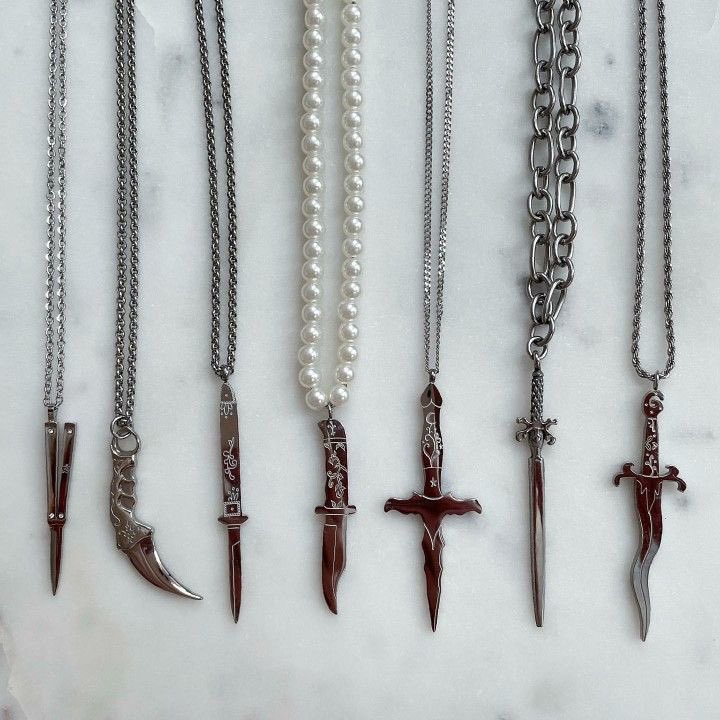 gh0stfacegf's tweet image. dagger necklaces † ⋆.˚
