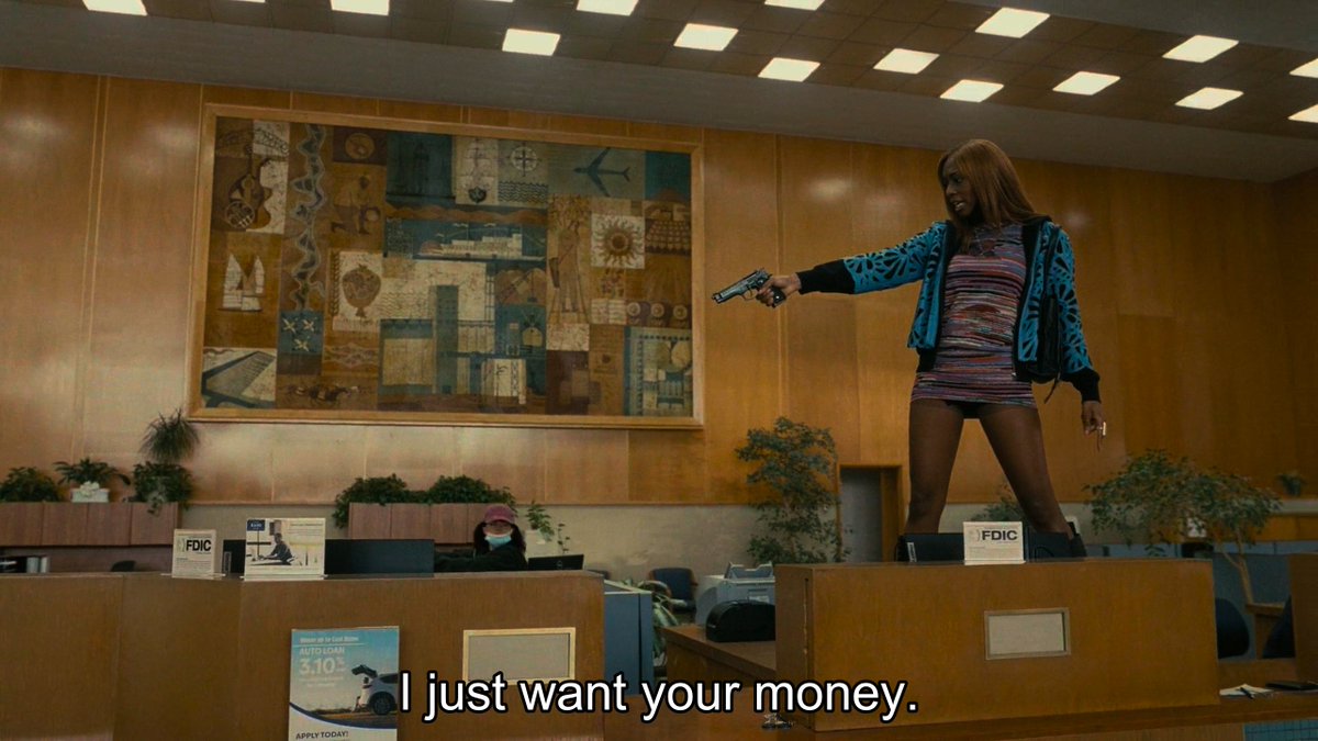 ColdCriti's tweet image. The worst scene was the bank robbery where the "revolutionary" showing her face, threatening civilians, prancing on the tables talk about "I am what black power looks like". This doesnt read like anyone that supports "black power" &amp;amp; more like giftwrapped republican propaganda.