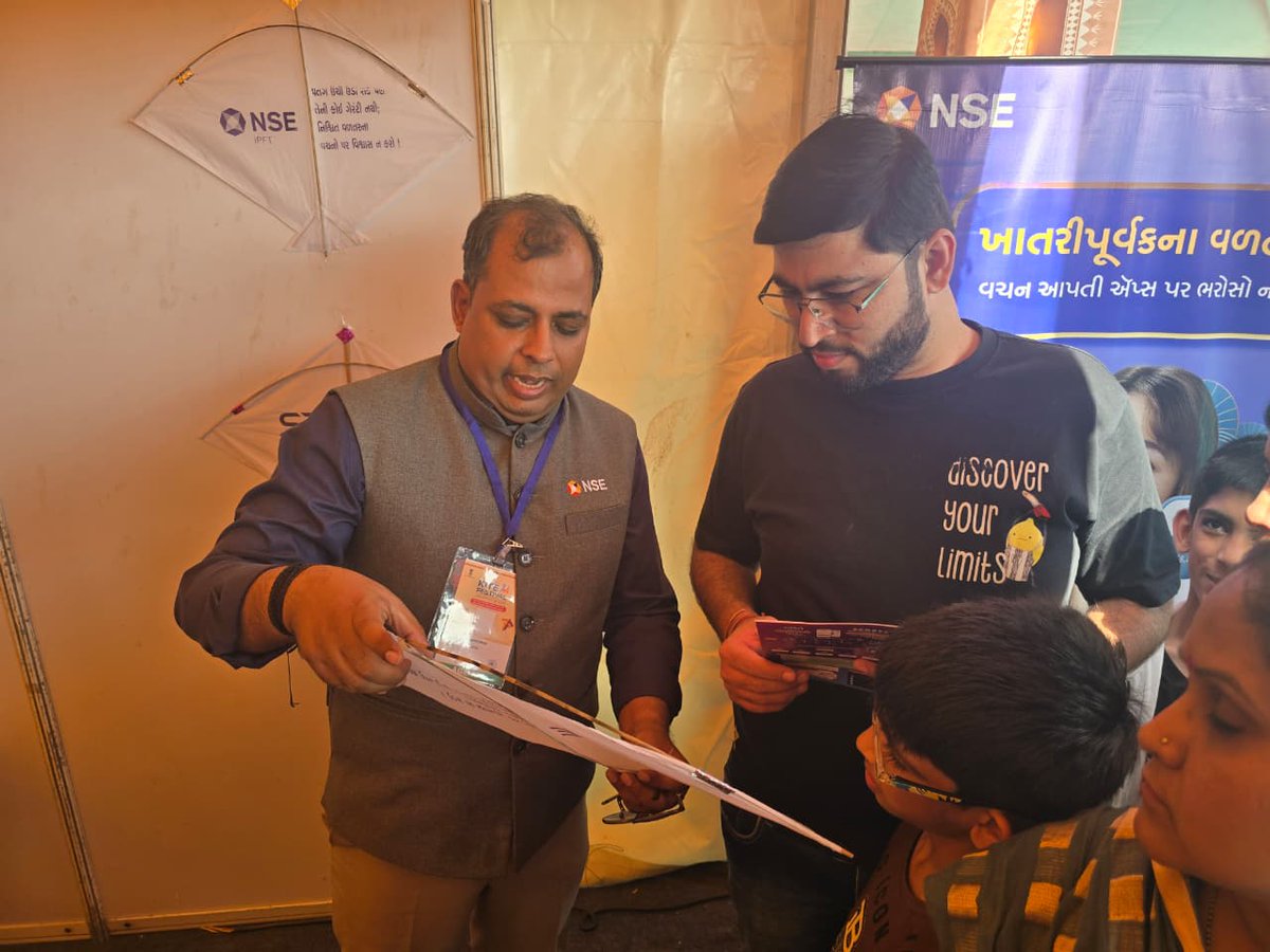 NSEIndia's tweet photo. At the International Kite Festival (IKF) 2026 at Ahmedabad and Jaipur, NSE took investor awareness to new highs. 
Through a dedicated stall, we distributed free kites carrying investor awareness messages—using the spirit of kite flying to spark conversations on smart investing.

The symbolism of kite flying - aspiration, balance, vigilance and foresight align naturally with principals of smart investing and investor protection.
Visitors also received simplified guidance on investor rights, grievance redressal, fraud prevention, and safe investing practices through quick, engaging interactions at the stall.

#NSE #NSEIndia #InvestorAwareness #FinancialLiteracy #IKF2026 #SmartInvesting #InvestorProtection #SafeInvesting #KnowYourRights #FraudPrevention #FinancialWellbeing #MarketEducation @ashishchauhan