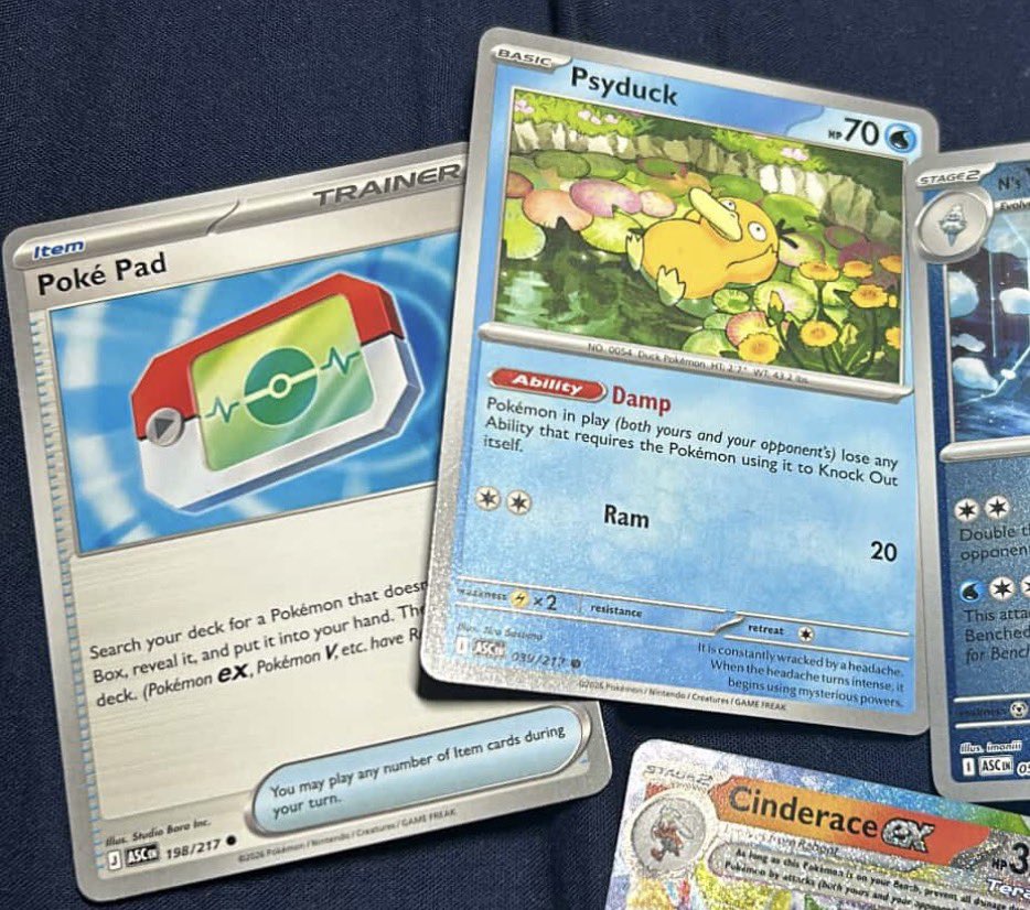 TrustYourPilot1's tweet photo. Poke Pad is in Ascended Heroes!

This helps the vast majority of decks, so make sure you have a playset when it's out in 2 weeks on PTCGL!

Also, non-promo Psyduck is in ASC!

More new set details - https://t.co/78QiuGL1fx

Found by @amcharles0 and @pokegpa. https://t.co/PeH4fwgSYC