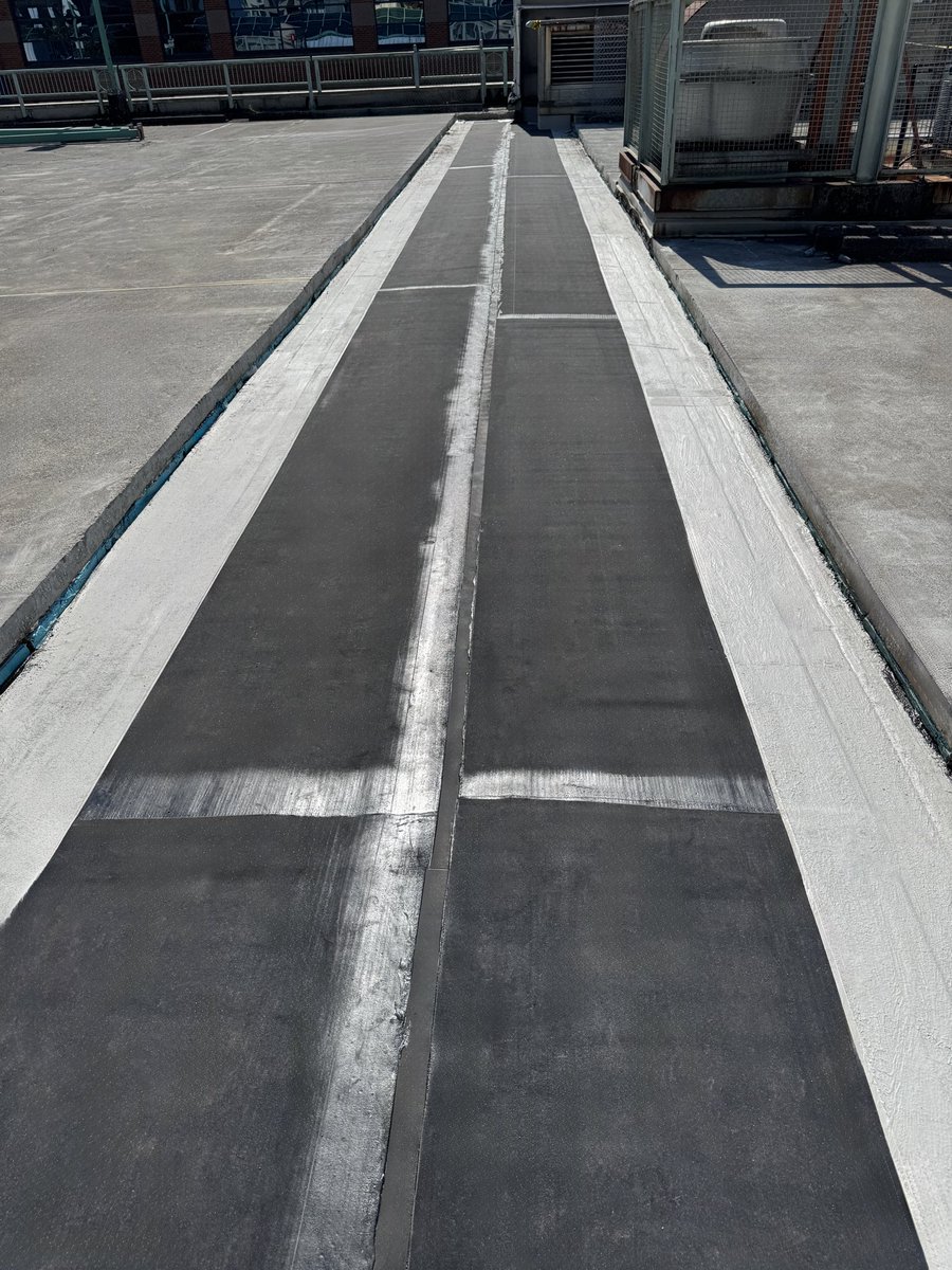 FlamLINE® showcasing SITURA Inc.’s flat profile. Custom Waterproof Expansion Joints maintain continuity through directional changes.☀️