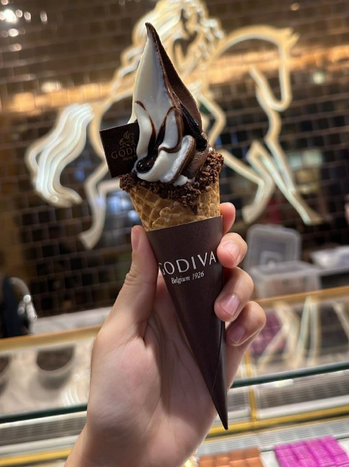 Indulging in a scoop of creamy, dreamy ice cream that's sure to satisfy any sweet tooth cravings. Who else loves this frozen treat as much as I do?