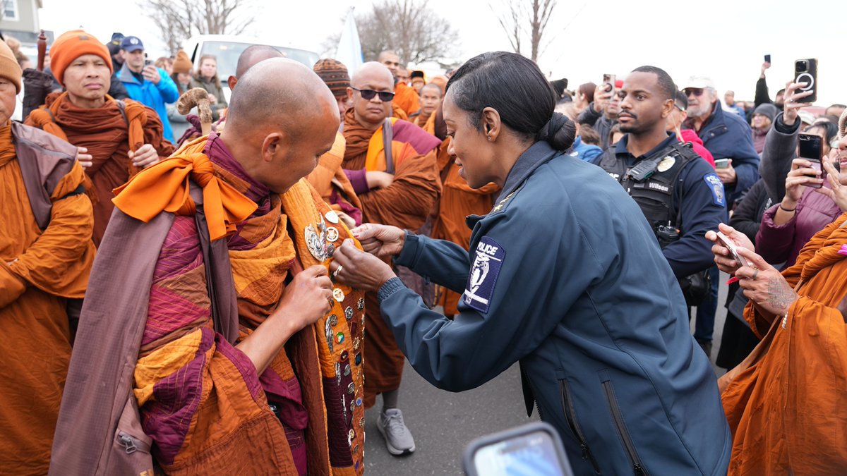 CMPD's tweet image. We were honored to welcome the Buddhist monks today as they pass through our community on their Walk for Peace. Our officers are proud to provide the monks with a safe escort as they continue their journey of compassion and unity.