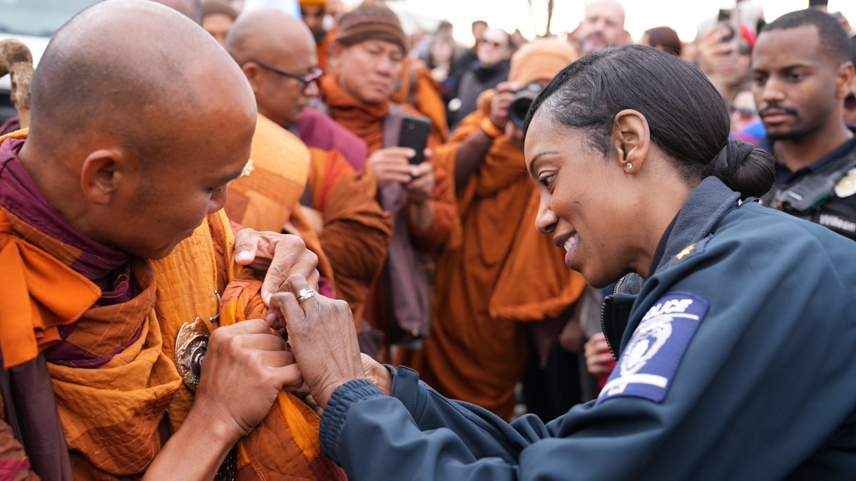 CMPD's tweet image. We were honored to welcome the Buddhist monks today as they pass through our community on their Walk for Peace. Our officers are proud to provide the monks with a safe escort as they continue their journey of compassion and unity.