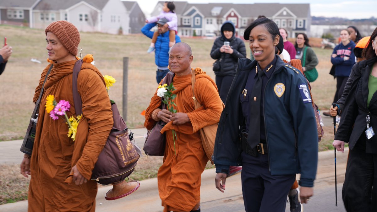 CMPD's tweet image. We were honored to welcome the Buddhist monks today as they pass through our community on their Walk for Peace. Our officers are proud to provide the monks with a safe escort as they continue their journey of compassion and unity.