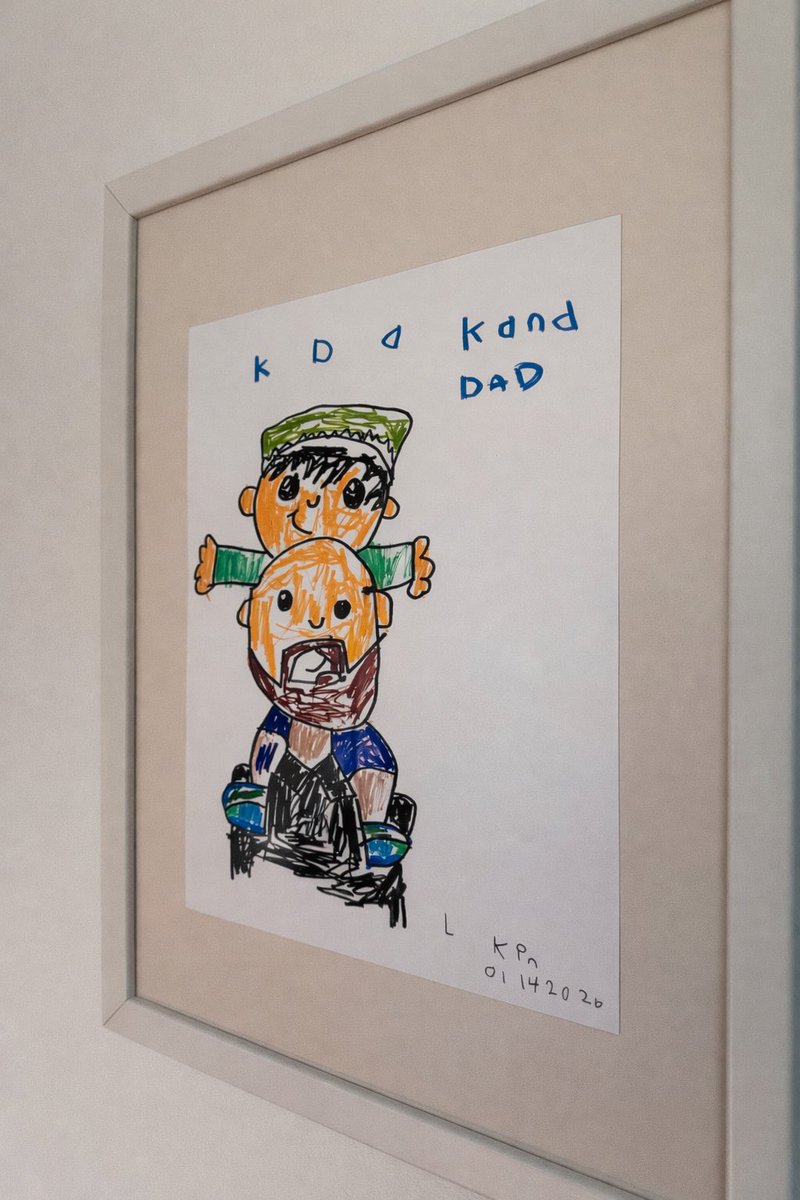 Every year I commission my son to draw a picture of just the 2 of us for my office. Here is this year's entry 😀