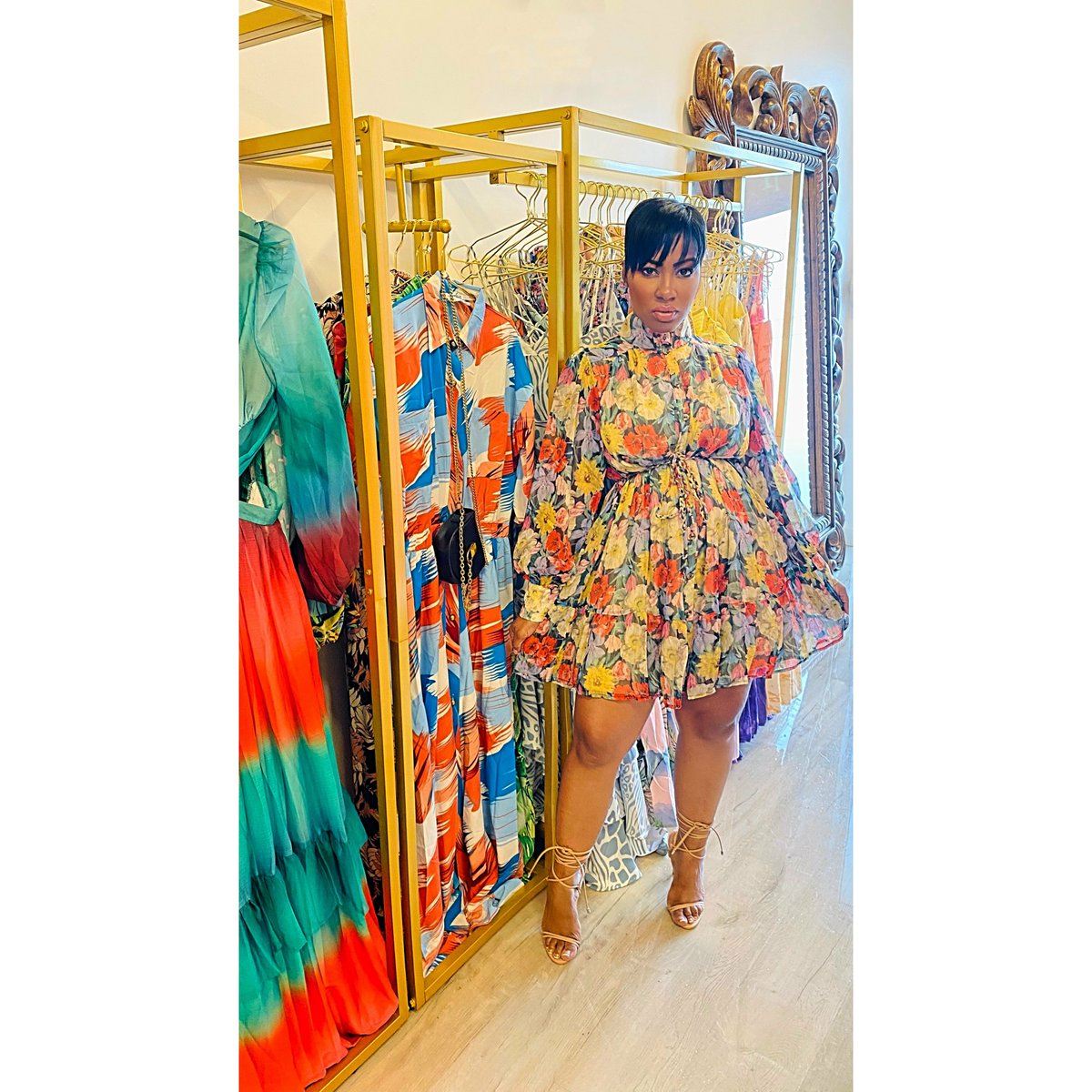 Products's tweet photo. Elevate your style with the vibrant Shannon Floral Dress, perfect for any occasion.